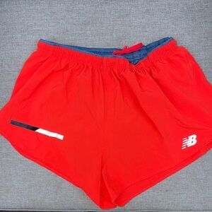New Balance Bright Orange Athletic Shorts with Reflective Trim